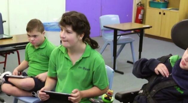 Tyrone, Alana and Andrew in the classroom